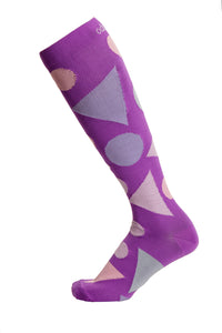 Purple compression sock with triangles and circles (dots). Side view.