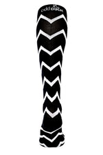 Black and white compression sock with zigzag pattern. Back view.
